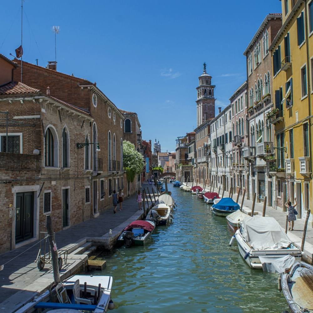 a canal with boats in it