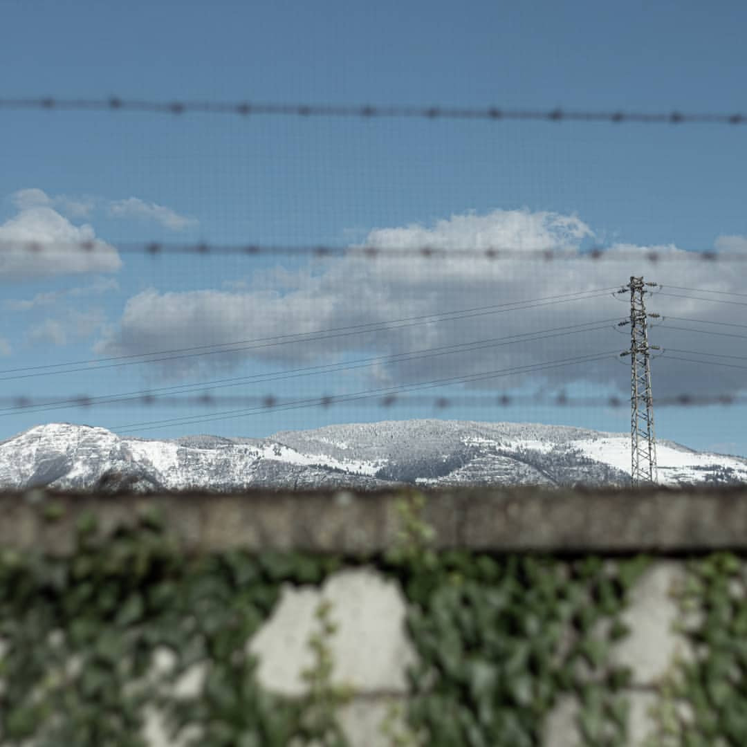 a fence with snow on it