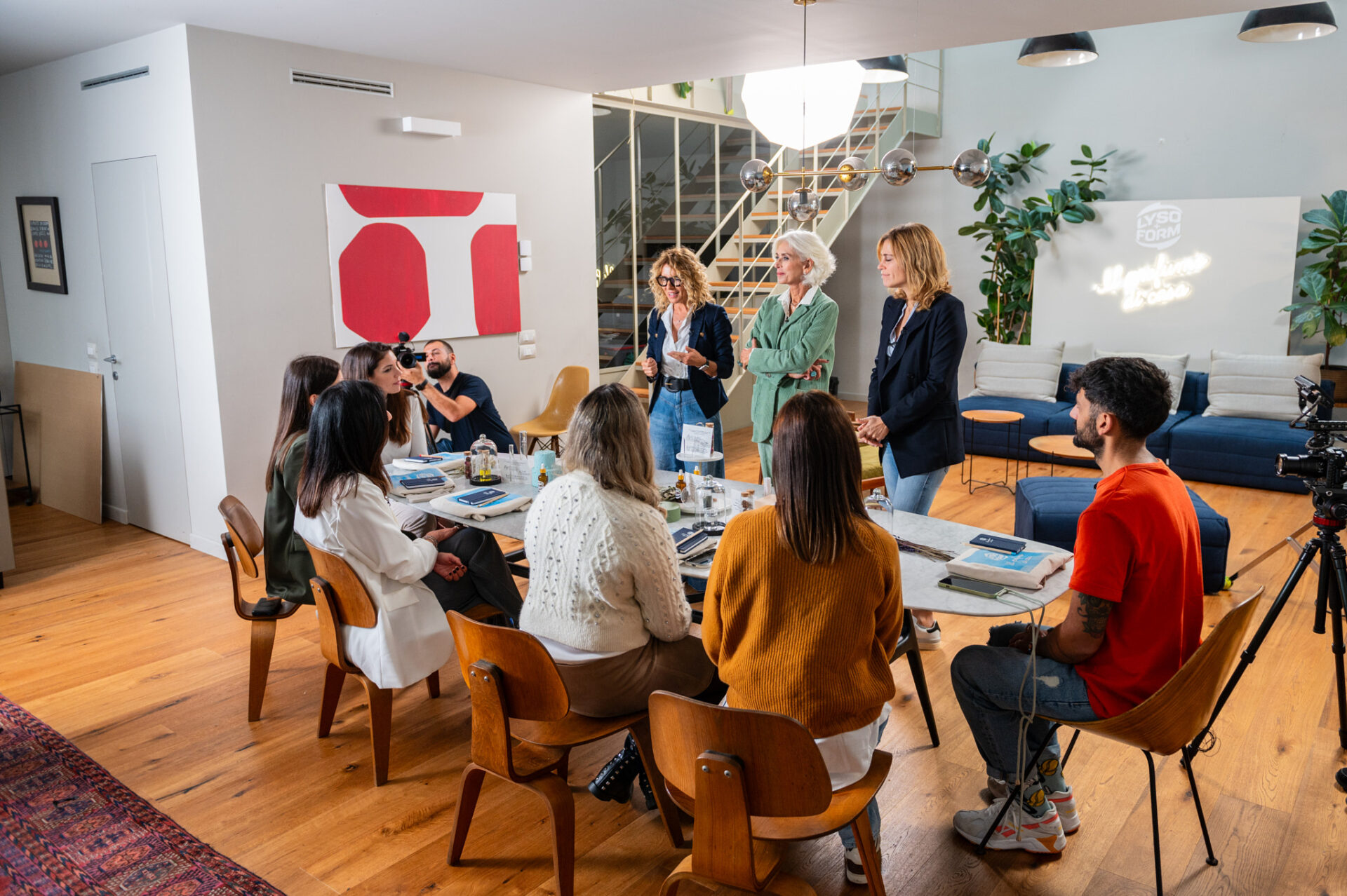 a group of people sitting around a table
