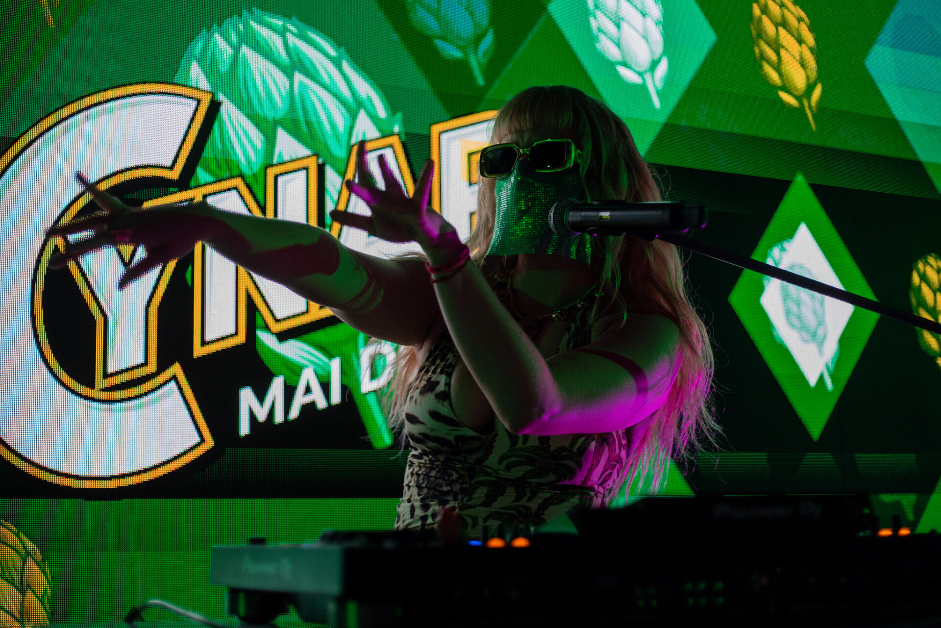 a person on a stage with a microphone