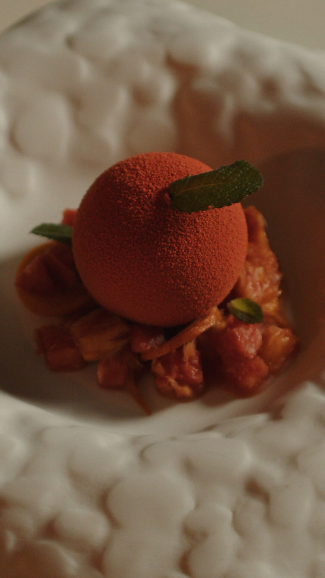 a plate of red pastry food