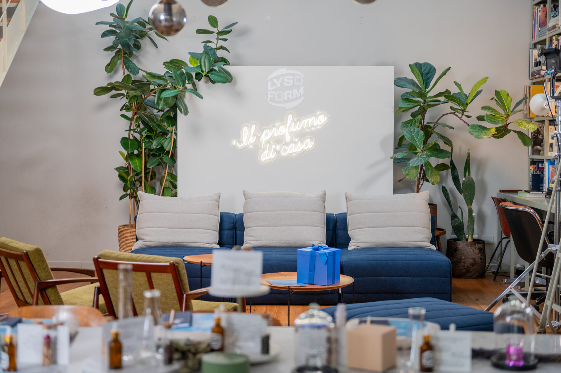 a room with a couch and tables