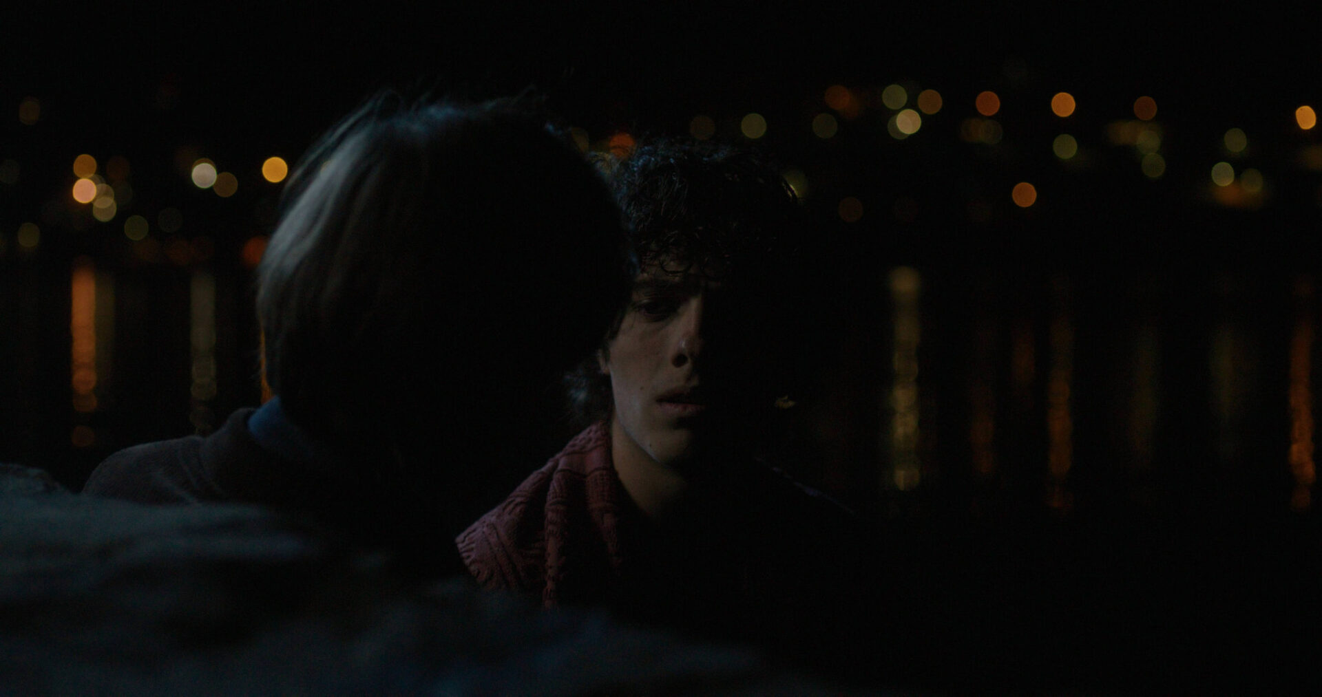 a woman and a man looking at each other